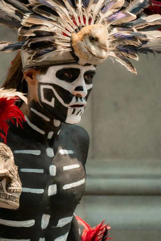 a person with a colorful headdress on