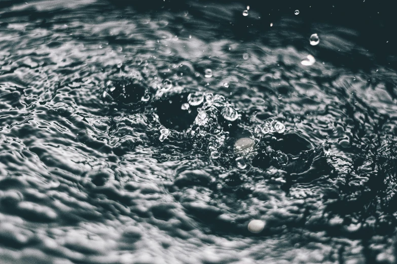 water ripples into a bowl of some sort