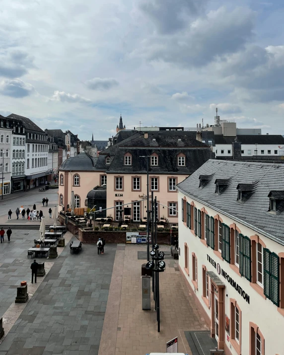 the city has many pink buildings and a few green trees