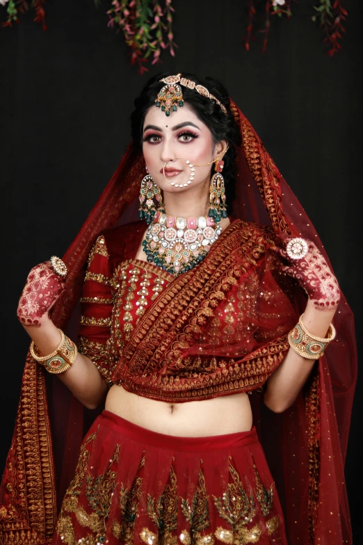 a woman in a red indian garb