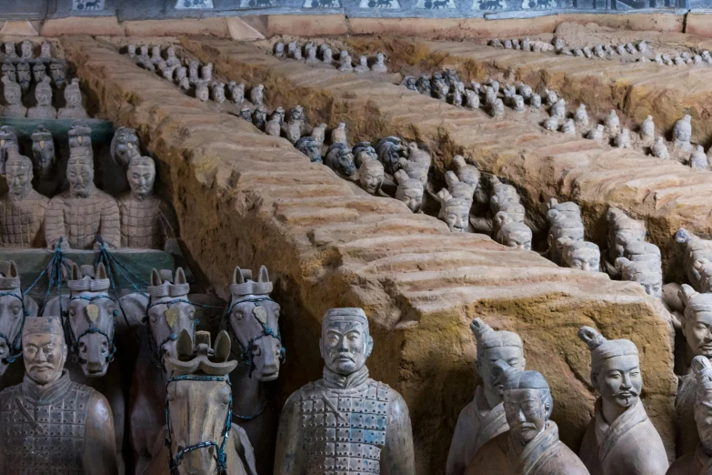 clay clay figures are displayed on display at an exhibit