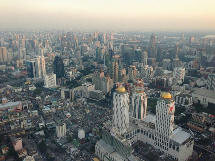 a cityscape taken from an airplane flying above it