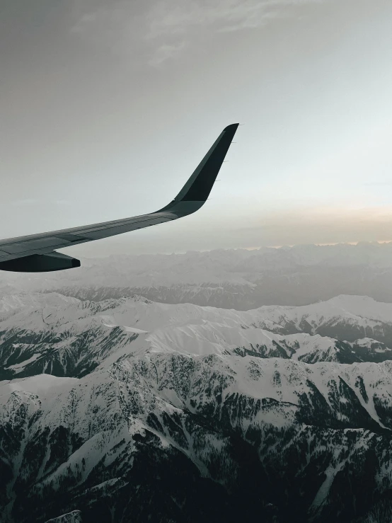 the wing of an airplane that is in flight