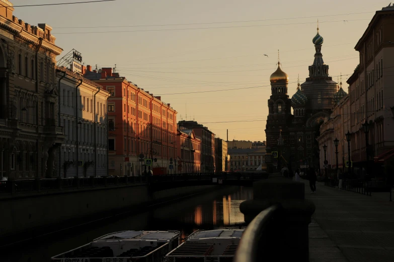 people are walking along an urban street