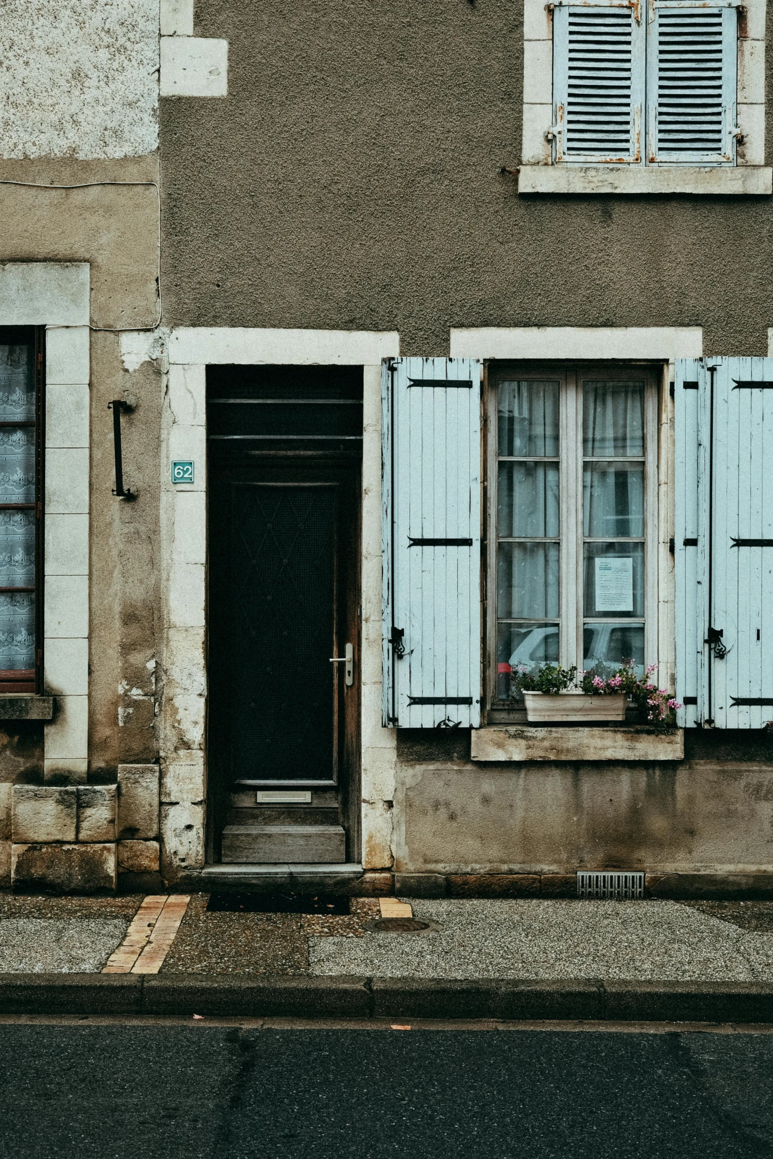 a home with shutters on both sides