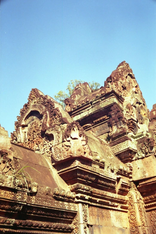 an intricately carved statue in the center of a large building