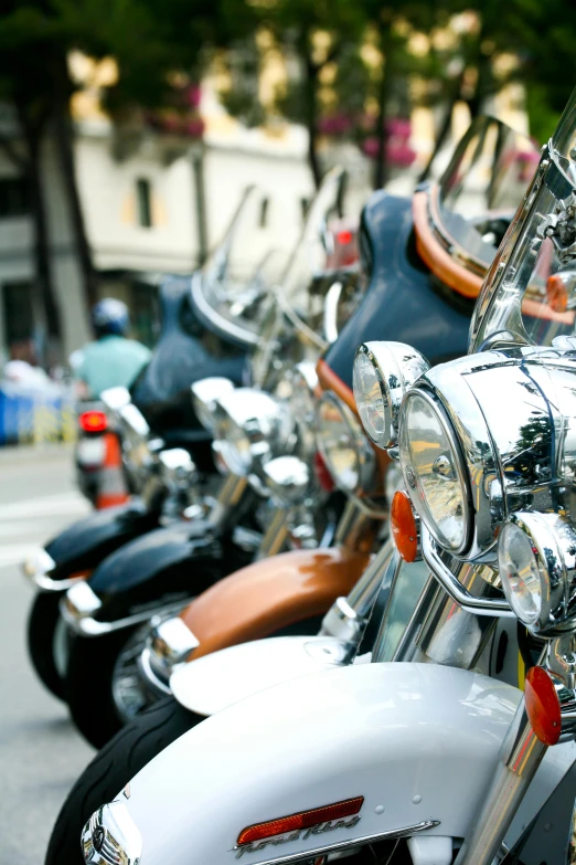 several motorcycles are parked side by side in a row