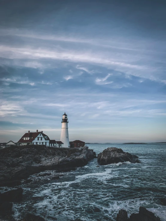 the lighthouse is visible from across the ocean