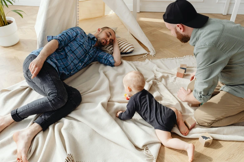 an adult and child are on the floor