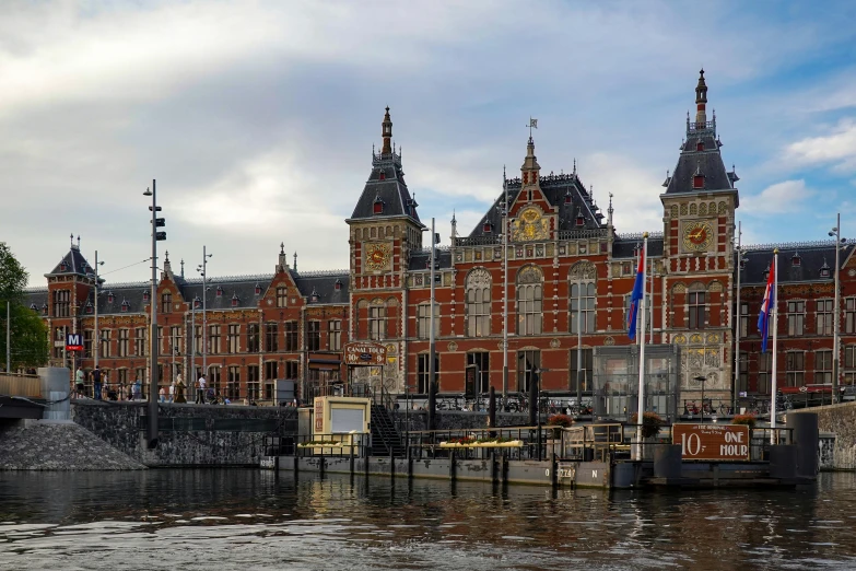 a castle with lots of tall spires and flags