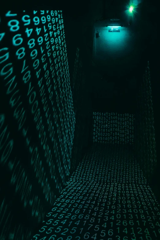 an underground room filled with glowing numbers and data