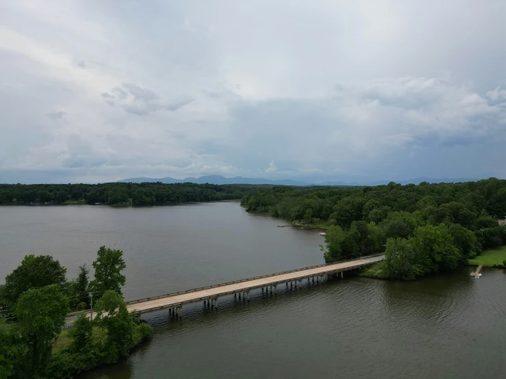 a bridge spans across the water from another river