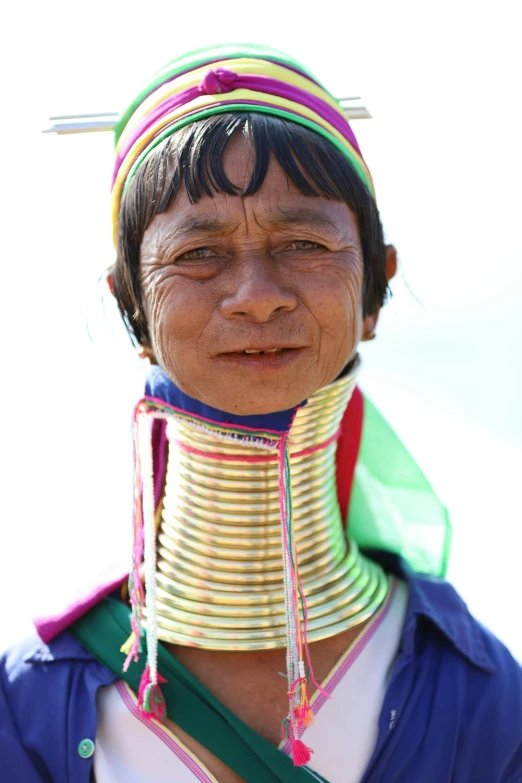 an image of a woman with a coiled head piece