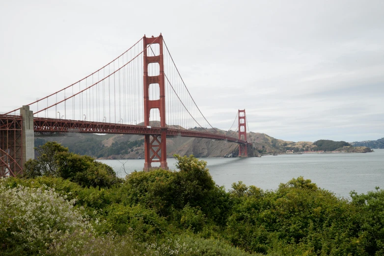 the golden gate bridge is viewed from the water