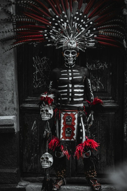 a skeleton costume sitting on the side of a building