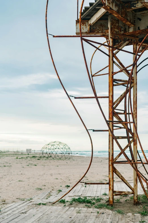 an industrial spiral design metal structure in the desert