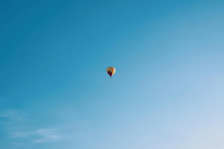 a  air balloon flying in the sky