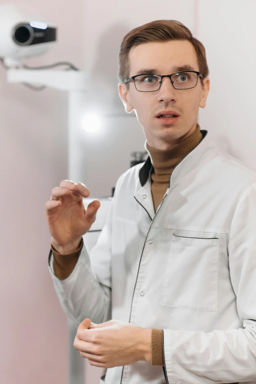 a male model in a white jacket in a mirror