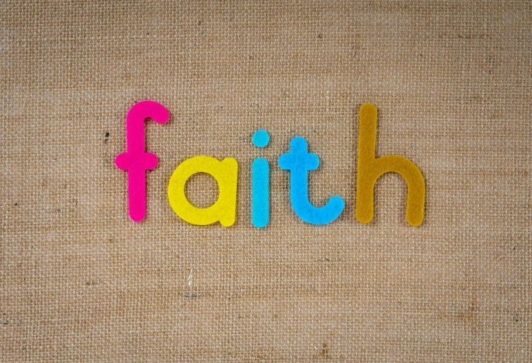 a word with the word faith cut out of it