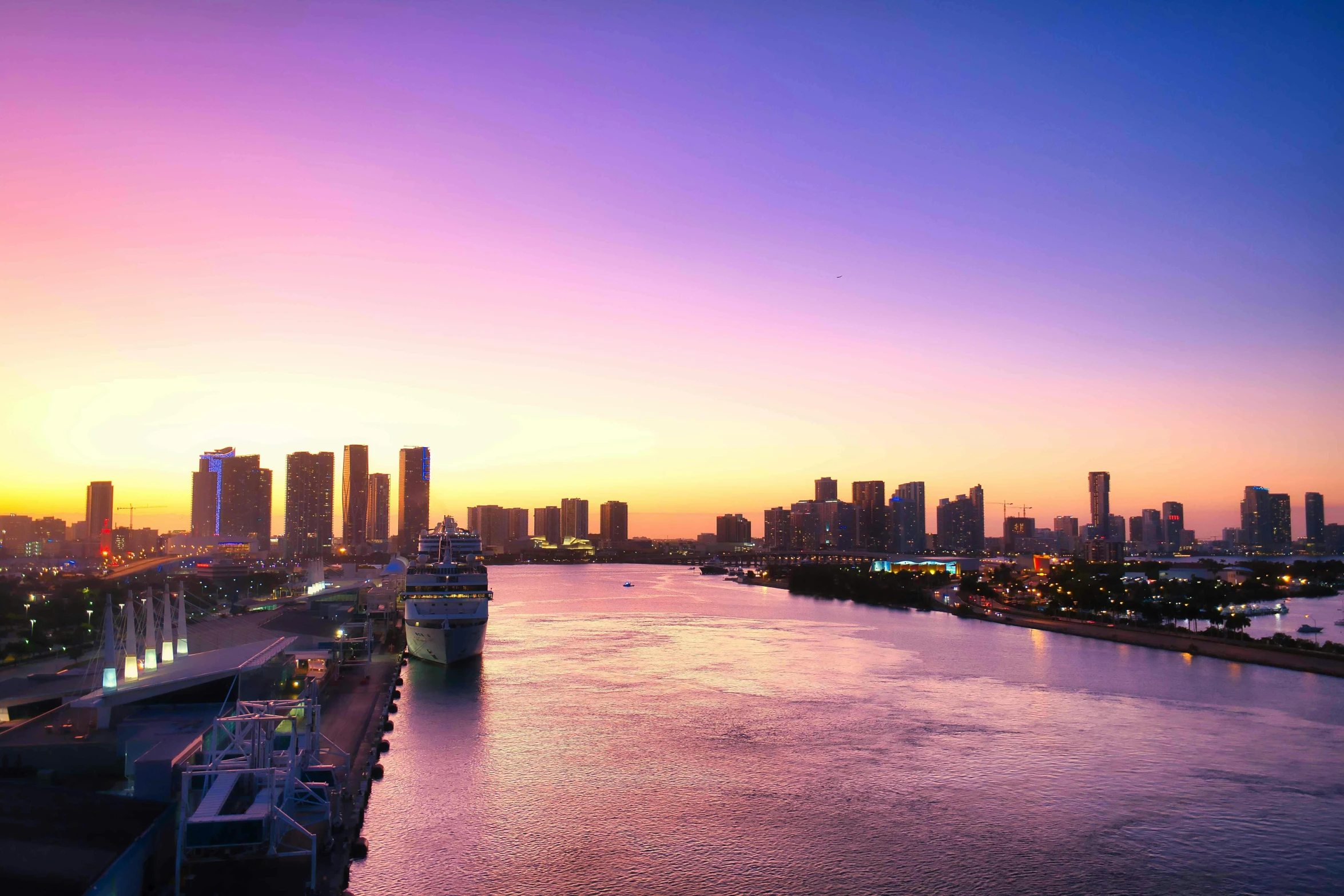 a large body of water surrounded by a city