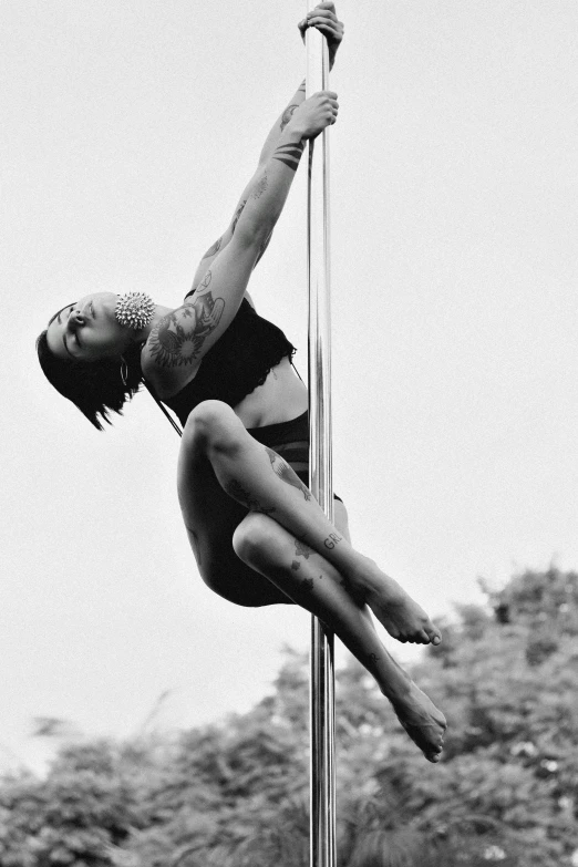 a male pole walker jumping off a high jump