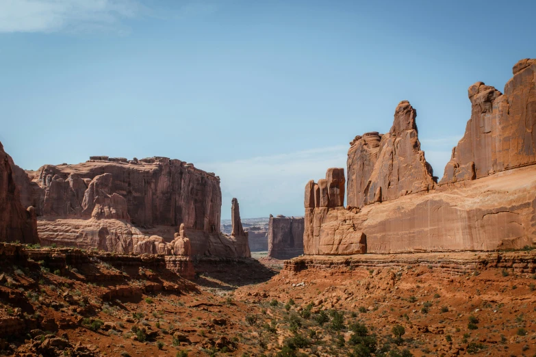 the desert is very rocky with several small mounds