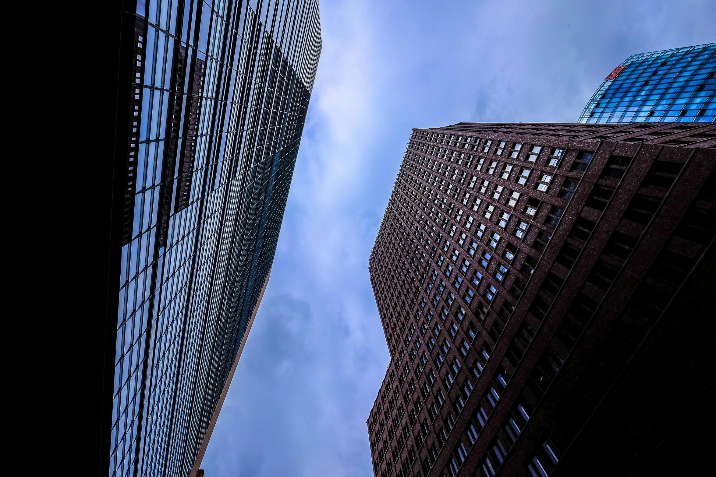 two buildings facing one another in the daytime