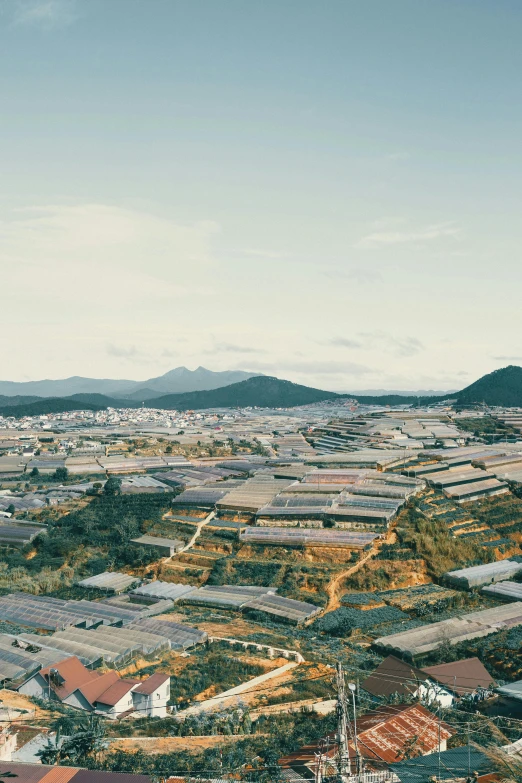 a large city with lots of buildings and hills