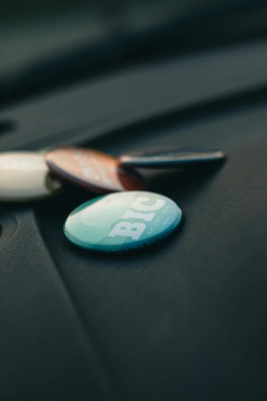 a blue and white object resting on black cloth