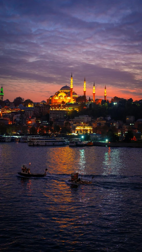 a city is shown at night lit up by lights