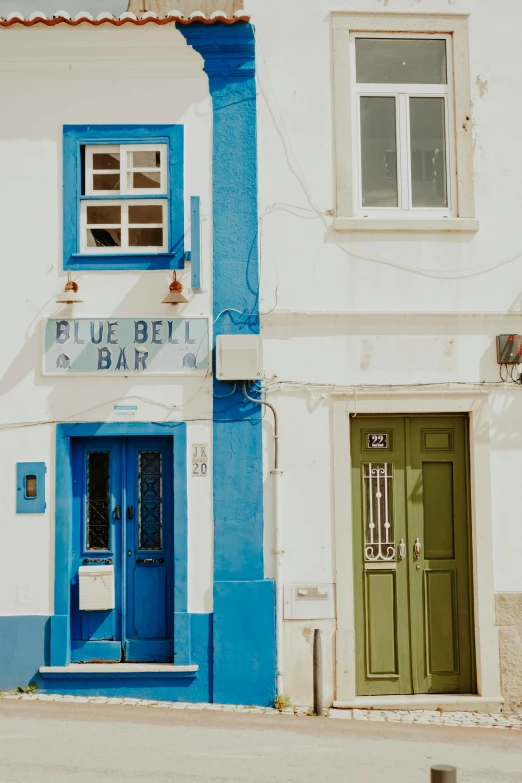 an entrance to the restaurant blue belt bar