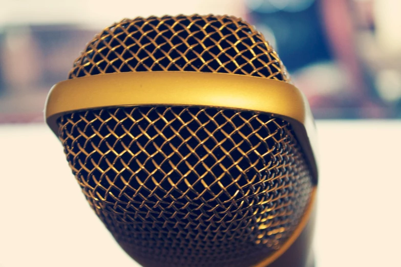 a microphone with some shiny wires on top of it