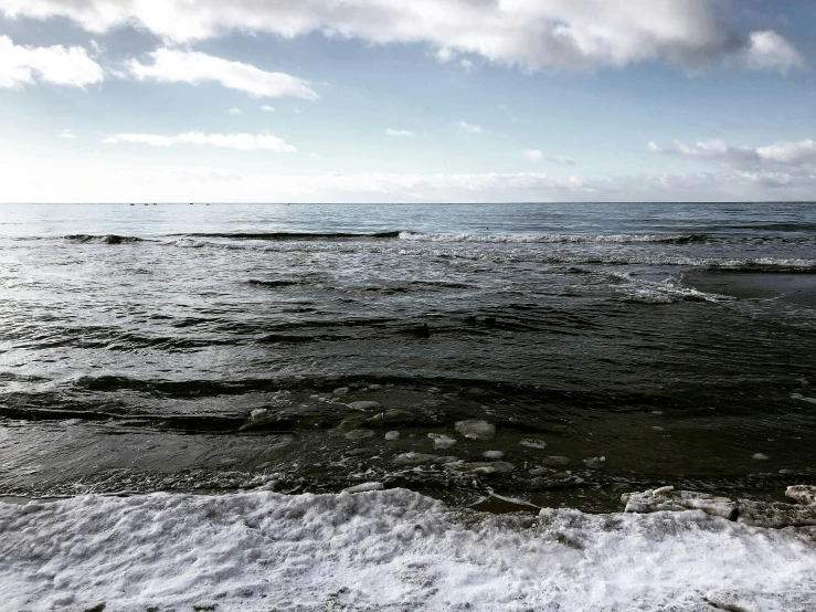 the ocean water has been very dark and dreary