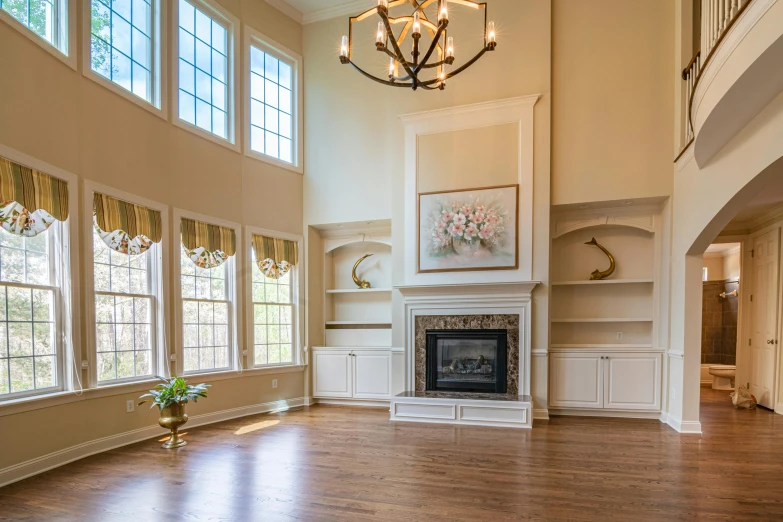 a fireplace is in the middle of a living room