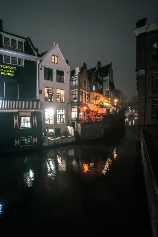 night time in a residential area with water and lights