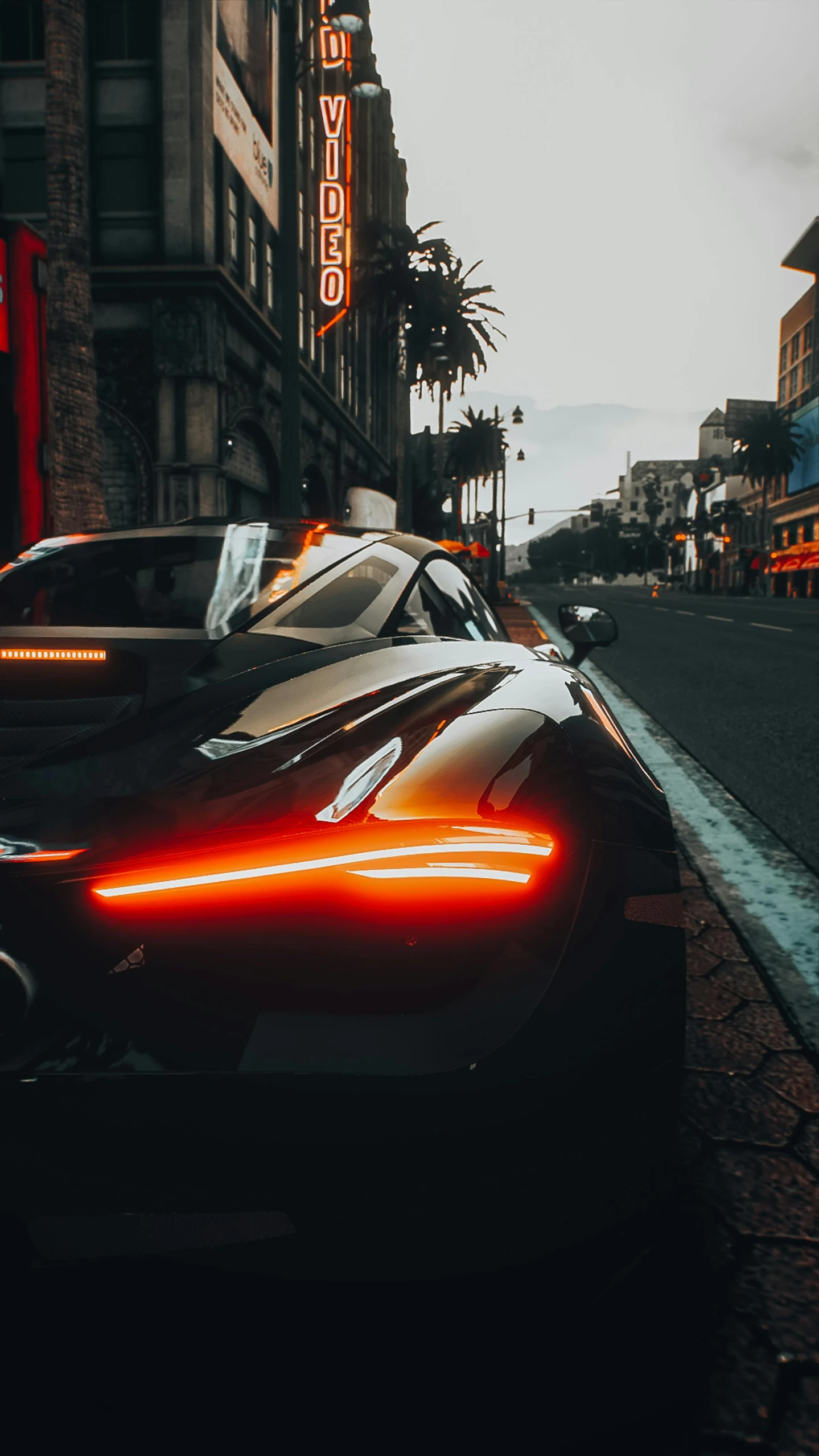 a car with its hood up on the street