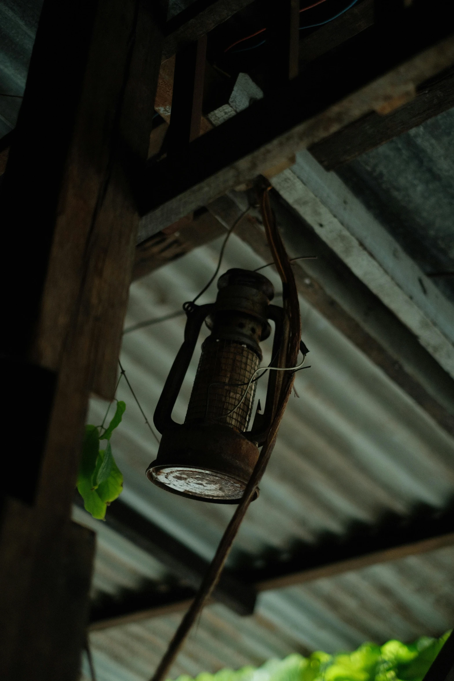 a hanging light attached to a roof