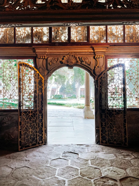 an open doorway with intricate design in the middle