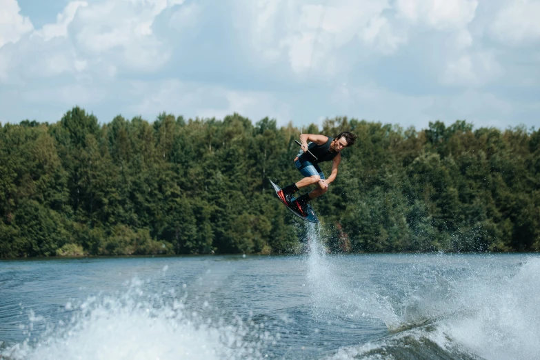 a person is riding the waves in the water