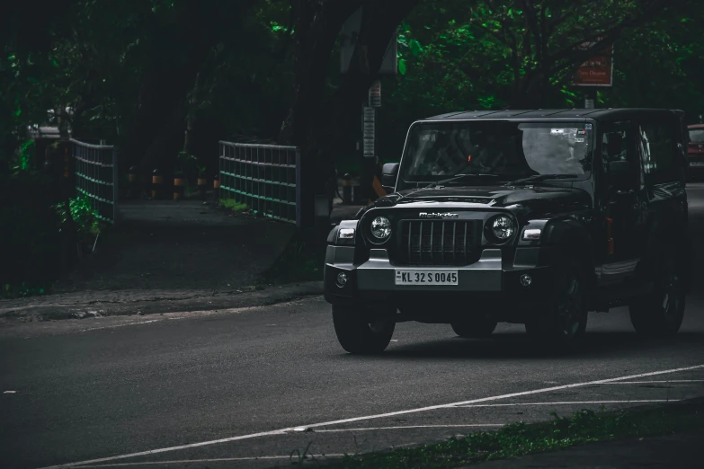 a vehicle that is driving down the street