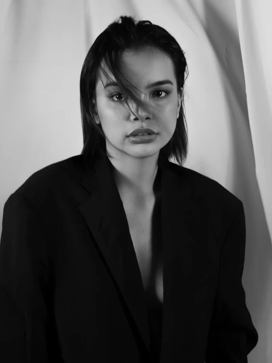 black and white po of woman with short hair