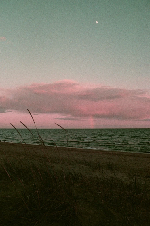 the view is in the dusk with pink and blue skies