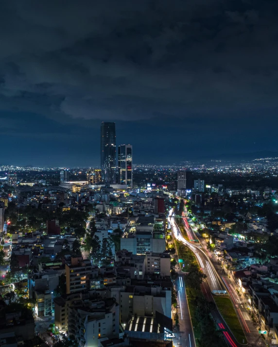 night aerial view of city with many lights