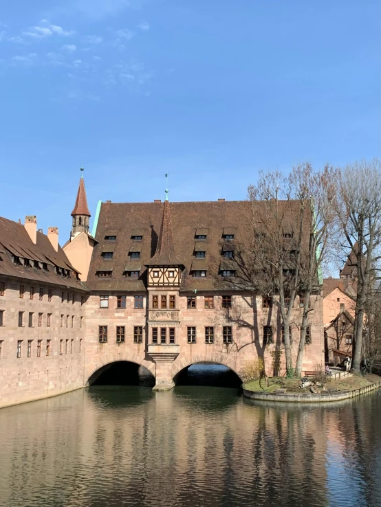 an old castle with three bridges going through it