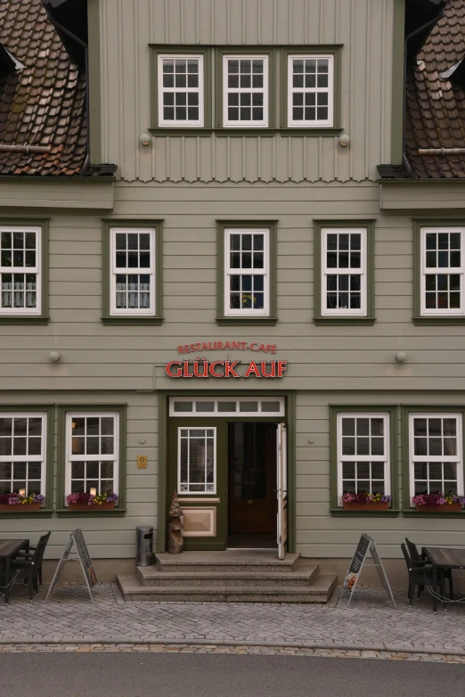 a restaurant is set up in the middle of a town