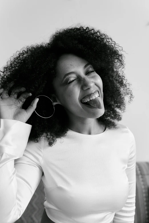 a woman talking on her cell phone in a black and white po