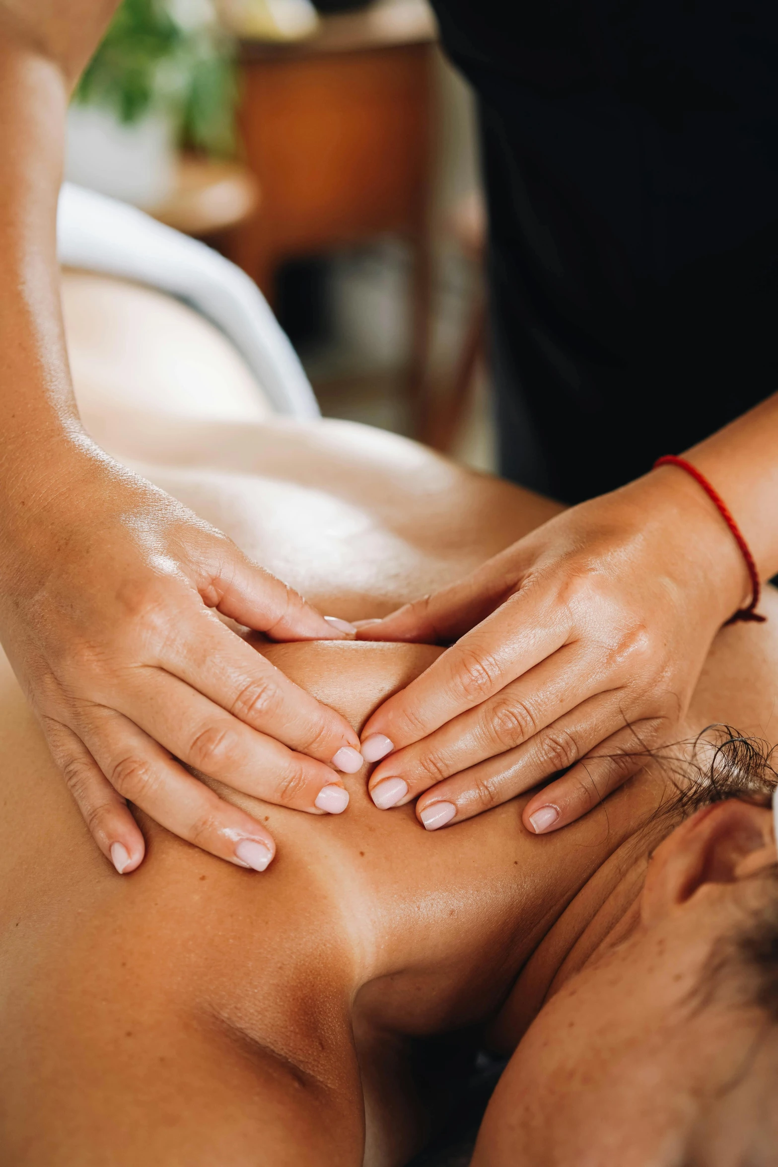 a woman that is getting a back massage