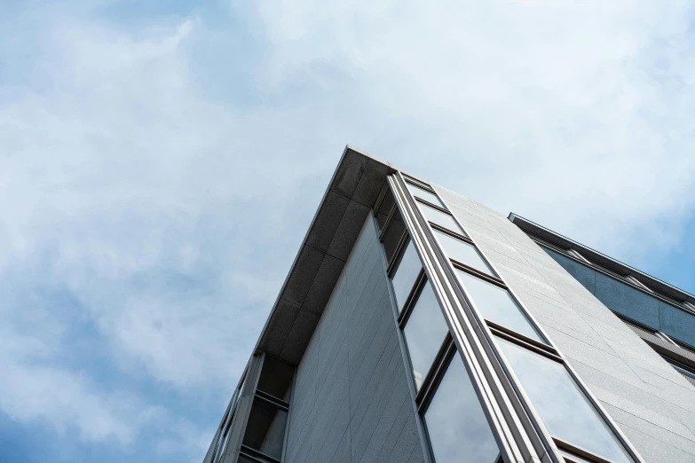 a blue sky that is over a building