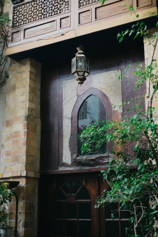 an old building with wooden balcony and doorway