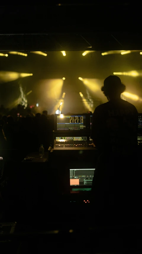 an image of dj performing at a concert